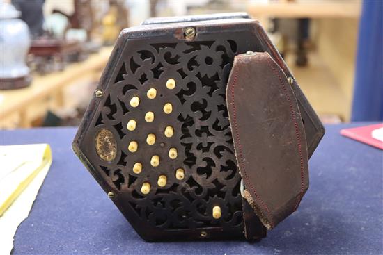 A Lachenal & Co mahogany concertina squeeze box, c. 1900-10, 30 bone keys, blade leatherette bellows